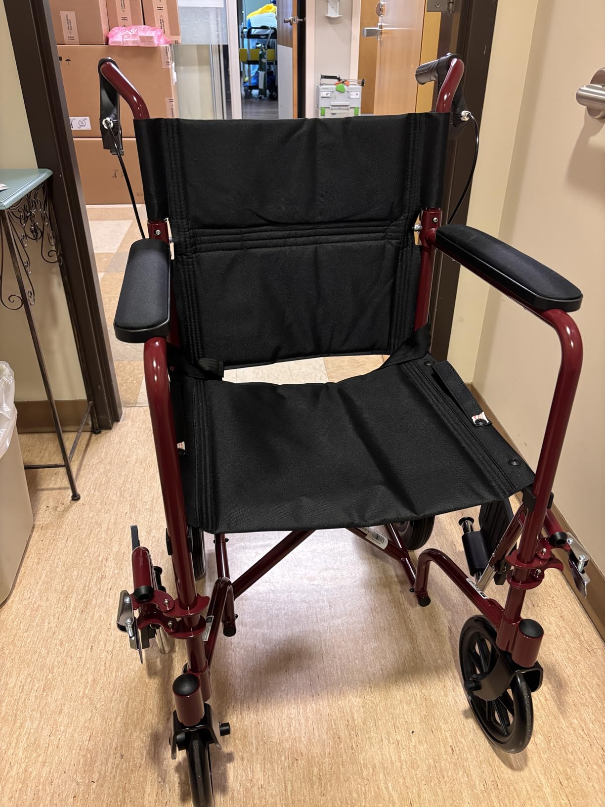 Medline Lightweight Foldable Transport Wheelchair with Handbrakes and 12-Inch Wheels, Red Frame, Black Upholstery customer photo 2