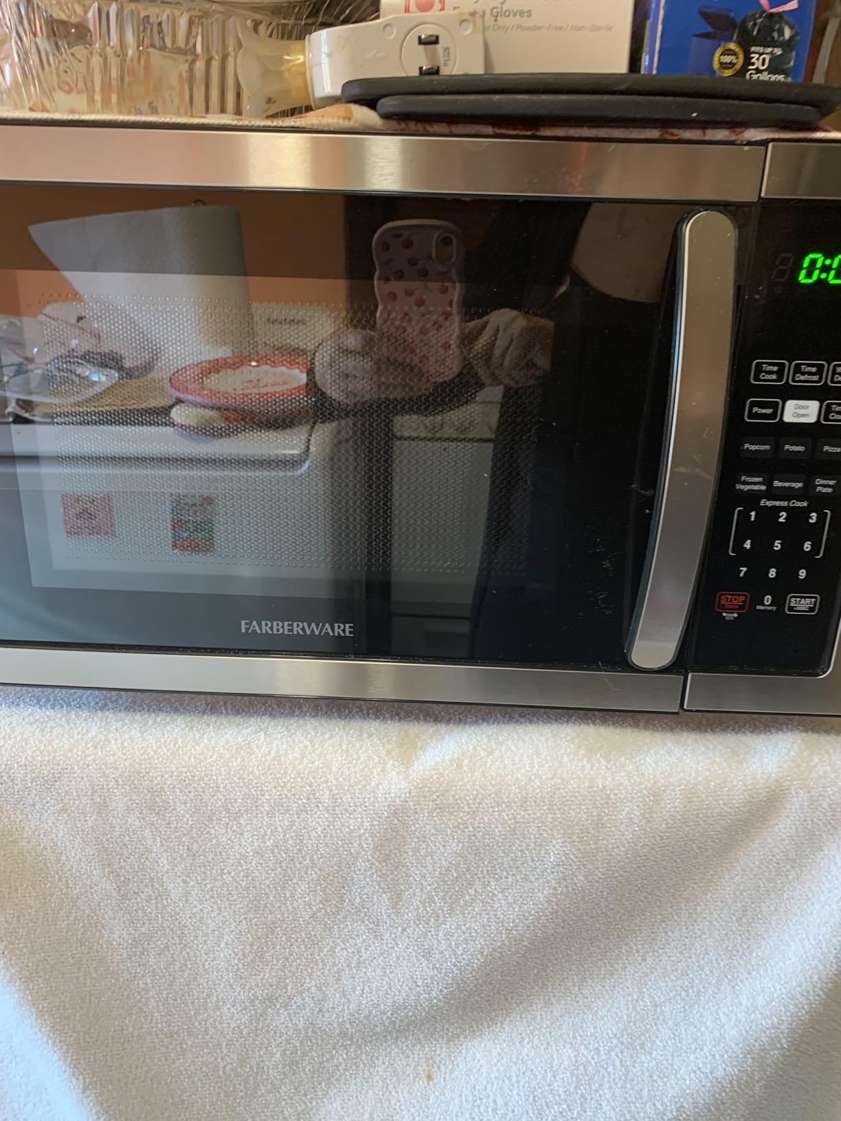 Farberware 1.1 Cu. Ft. Countertop Microwave Oven - 1000 Watts Power, Auto Cook Settings, Defrost, Easy Clean and Child Safety Lock - Stainless customer photo 2