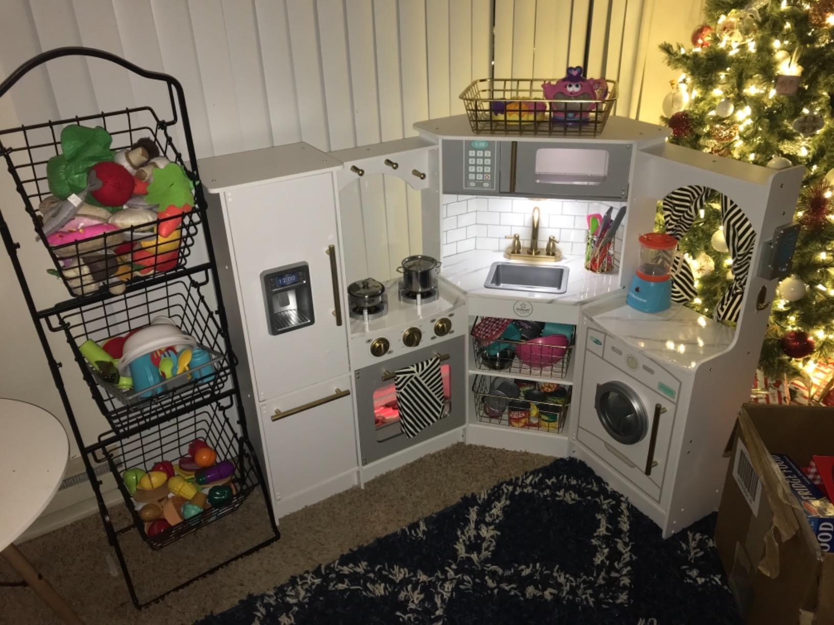 KidKraft Ultimate Corner Wooden Play Kitchen with Lights & Sounds, Play Phone and Curtains, White customer photo 1