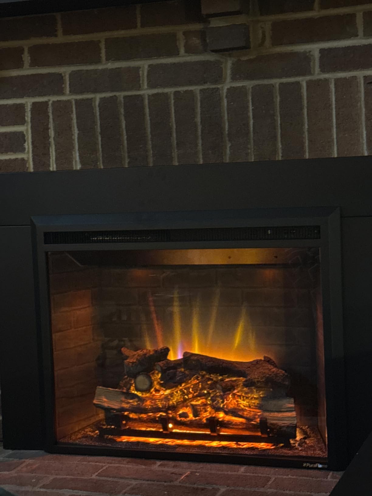 PuraFlame Western Electric Fireplace Insert with Fire Crackling Sound, Remote Control, 750/1500W, Black, 33 1/16 Inches Wide, 25 9/16 Inches High customer photo 1