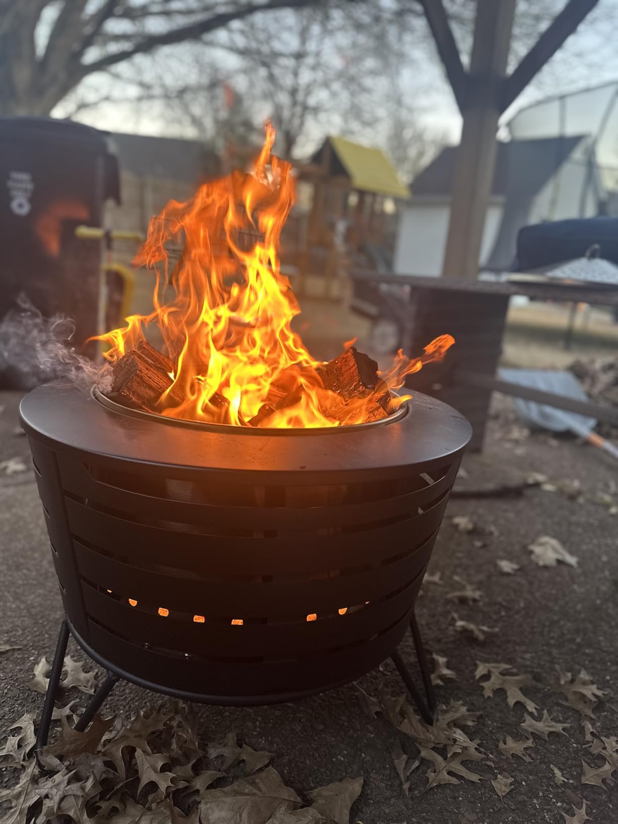 TIKI Patio Smokeless Fire Pit, 25 in Wood Burning Fire Pit with Cover | Black, 25-Inch, Stainless Steel, Wood-Burning, For Backyards and Patios, Includes Cover, Removable Ash Pan, Stand Included customer photo 1