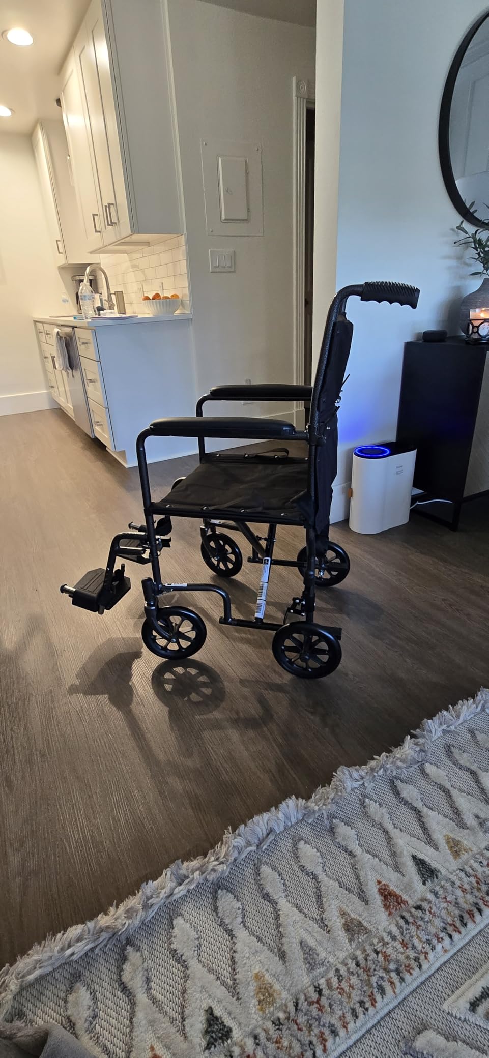 Medline Durable Folding Steel Transport Wheelchair with Swing-Away Footrests, 19-Inch Seat Width, Black Frame, Black Upholstery customer photo 1