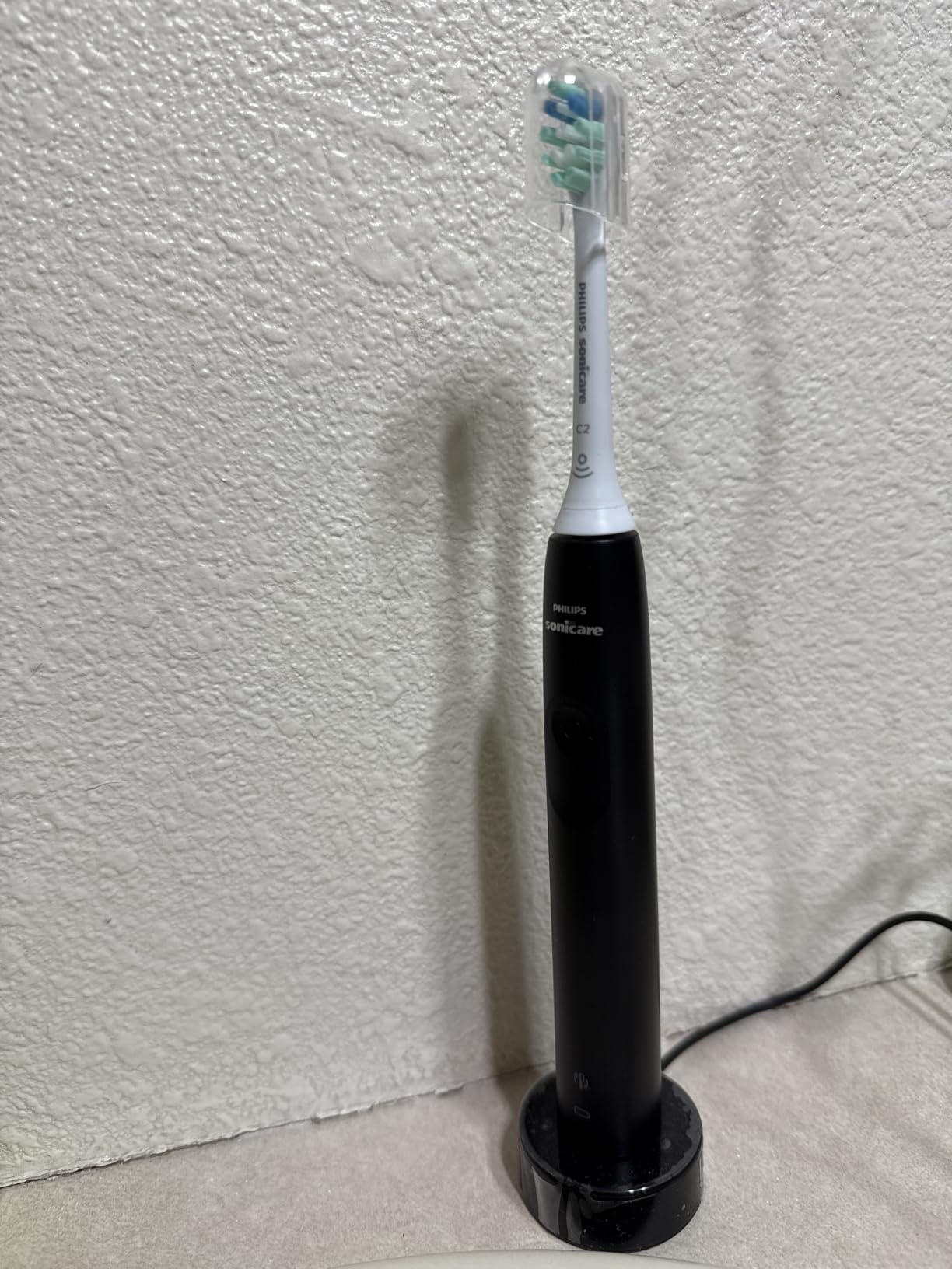 Philips Sonicare 4100 Rechargeable Electric Toothbrush, 1 Brush Head, Black - 700% More Plaque Removal, Pressure Sensor, 2 Brush Settings, 2-Minute Guided Timer, 14-Day Battery, HX3681/24 customer photo 1