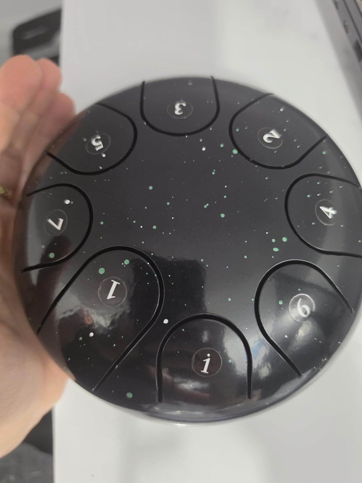ASTEMAN Handpan in D Minor, 432hz 22inches with 10 notes, comes with a backpack, courses, finger sleeves, stand, cleaning cloth, and two mallets. customer photo 1