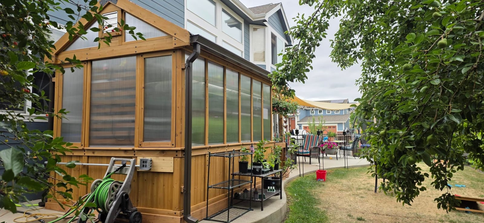 Backyard Discovery Bellerose 9' x 6' White Cedar Wood and Polycarbonate Walk-in Greenhouse Kit with Pergola, Exhaust Fan, Window, Hose Hook-Ups, PowerPort, Staging Shelves for Outdoor Gardening customer photo 2