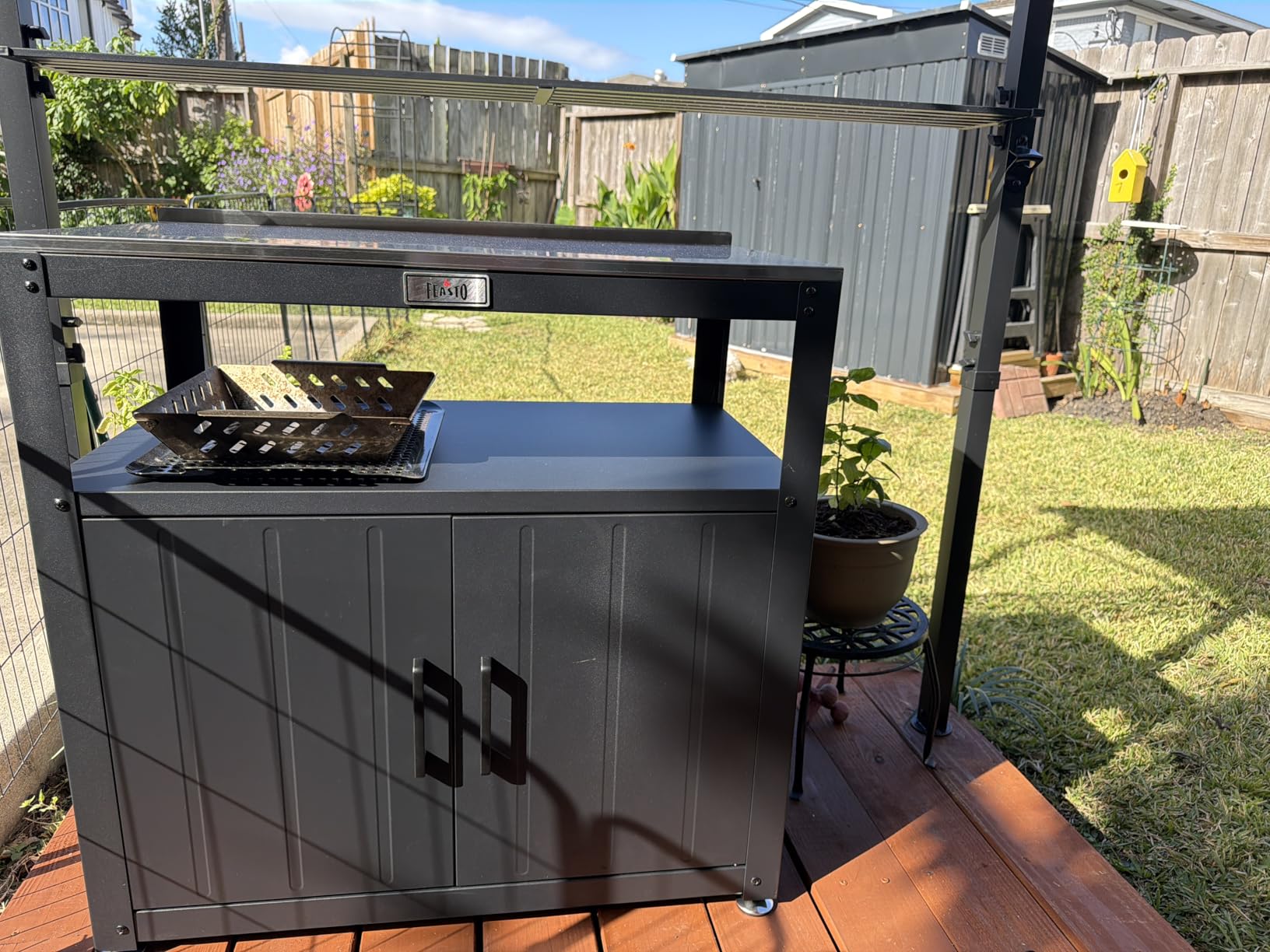Feasto Metal Outdoor Potting Bench with Storage Cabinet for Garden Work | Durable Metal Cabinet & Stainless Steel Top, Open Middle Shelf, Raised Edge & Adjustable Feet, for Patio, Lawn & Greenhouse customer photo 1