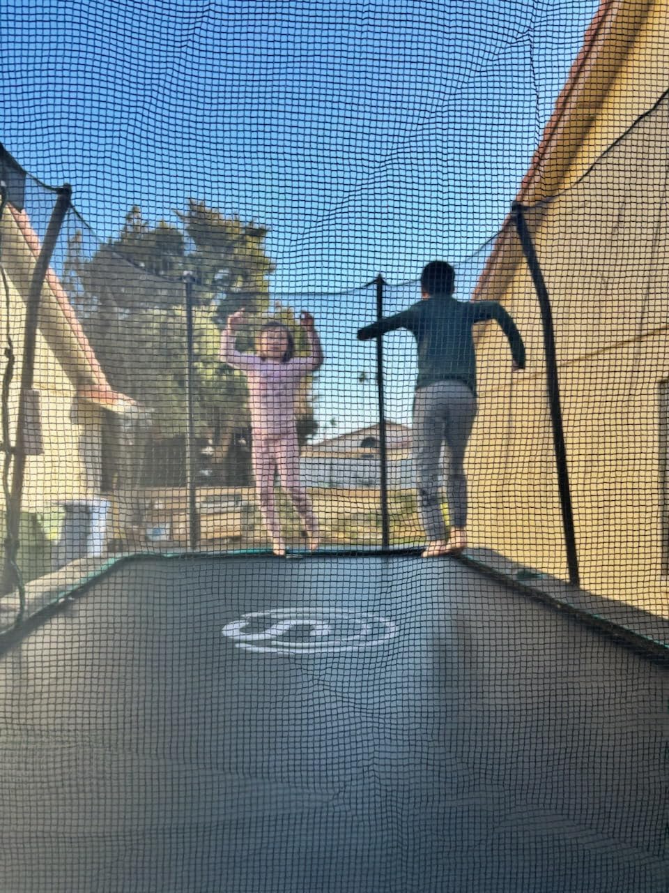 SKYWALKER TRAMPOLINES 12 FT 15 FT Round Trampoline with Safety Enclosure Net, 9 x 15 FT Rectangle Outdoor Trampoline, Recreational Trampoline for Kids customer photo 2