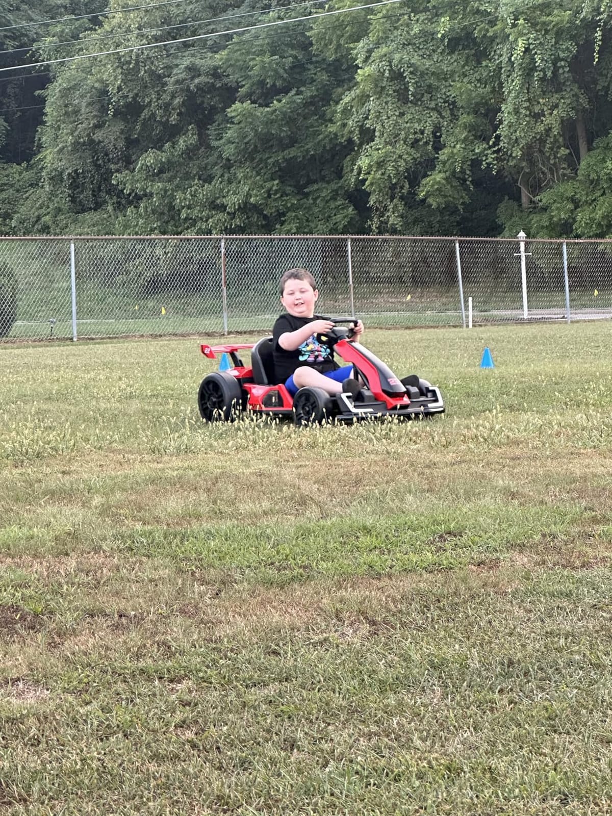 KerryYoo K61 Go Kart Electric Drift Kart with Length Adjustable Seat, 24V Outdoor Ride on Toy with 4 Speed Mode, Crazy Kart for Kids 6-12 Years Old, Fast 300W Motor, 8.5 MPH, Bluetooth - Red customer photo 1