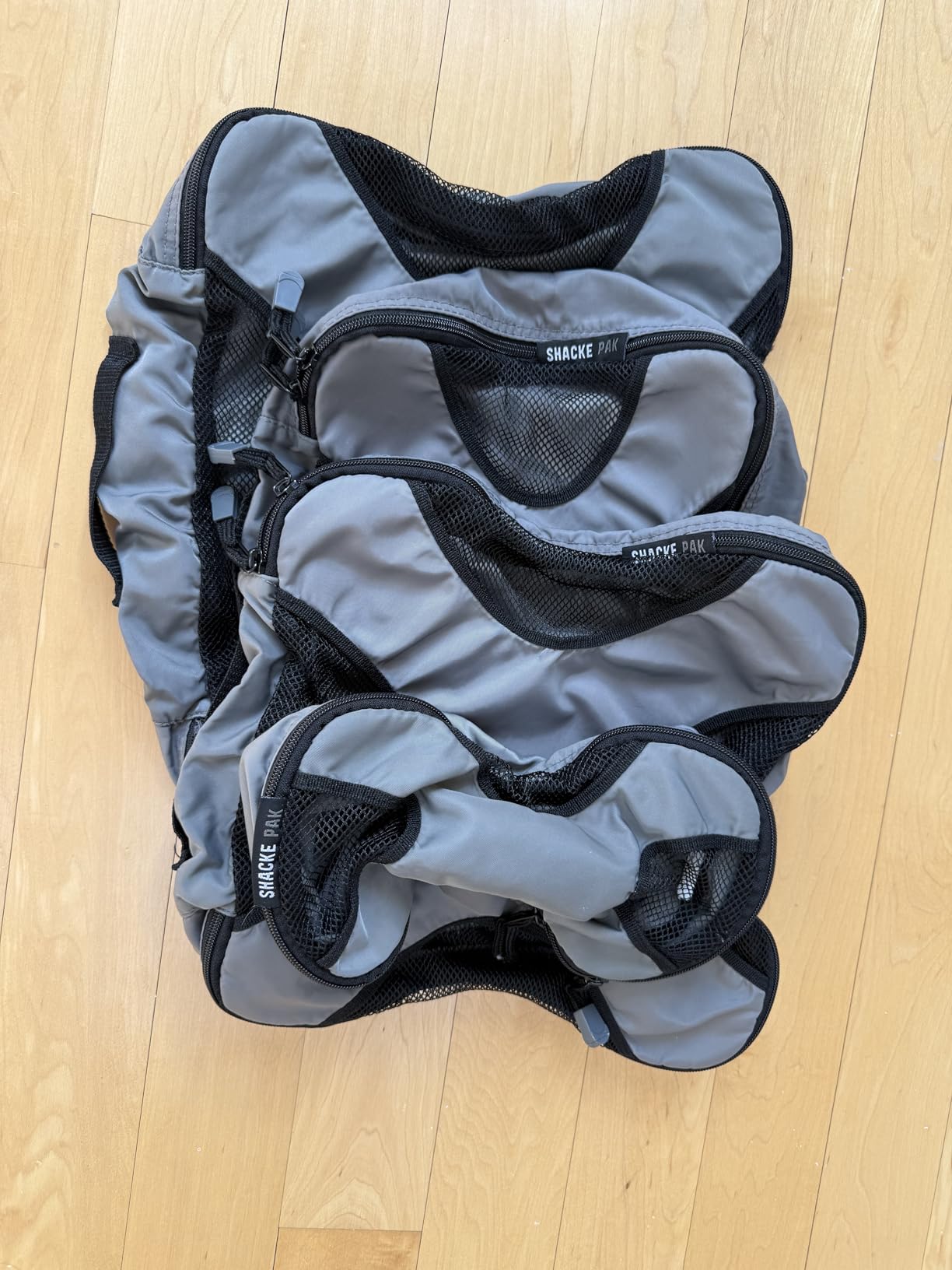 Shacke 5 Set Packing Cubes for Travel with Laundry Bag (Pure Black) | Suitcase Organizer Bags Set: 4 Water-Resistant Luggage Cubes, XL to Small, + Laundry Bag for Carry-On or Checked customer photo 2