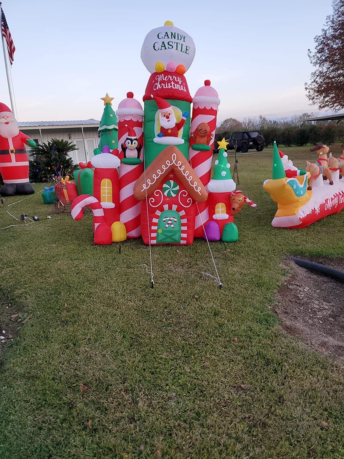 [Flash Light] 10FT Tall Christmas Inflatable Outdoor Decoration Candy Castle with Santa Gingerbread and Penguin, Christmas Blow Up Candy Castle Inflatables for Xmas Outdoor Decorations customer photo 1