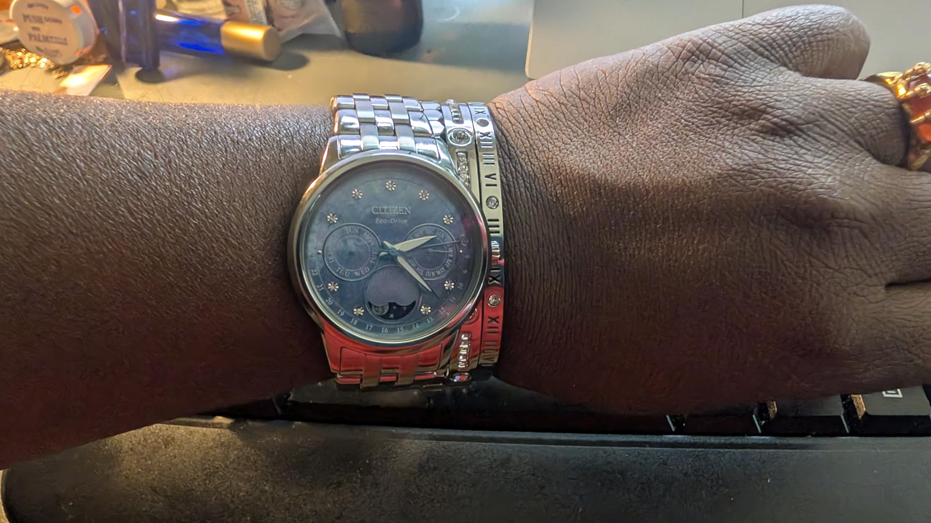 Women's Eco-Drive Calendrier, Moon Phase Diamond Accents Dial, Stainless Case and Bracelet Watch, Month/Day/Date customer photo 2