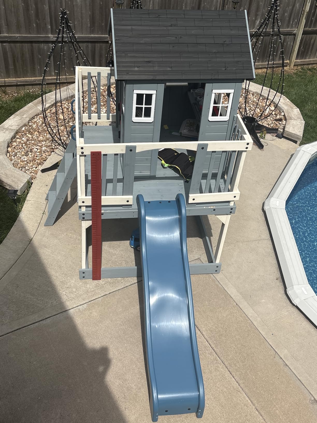 Backyard Discovery Beacon Heights Elevated Cedar Wooden Kids Playhouse with Wave Slide, Play Kitchen, Wrap-Around Deck, Flat-Step Ladder, Half Door, Windows, Bell, and Growth Chart for Outdoor Play customer photo 1