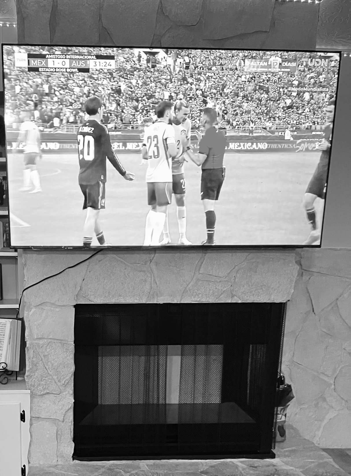 Amazon Basics Low Profile TV Wall Mount with Horizontal Post Installation Leveling for 37 to 86 inch TVs, Wood Studs Compatible, Black customer photo 2
