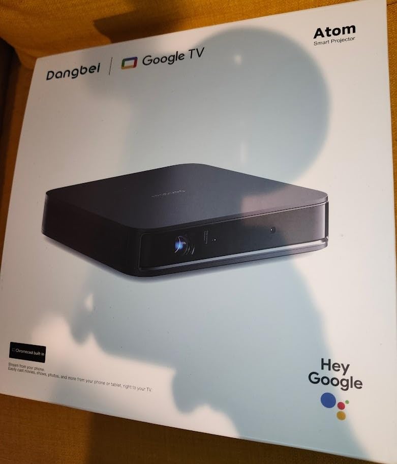 Dangbei Atom Portable Laser Projector, Google TV with Official Netflix, 1200 ISO Lumens, 180