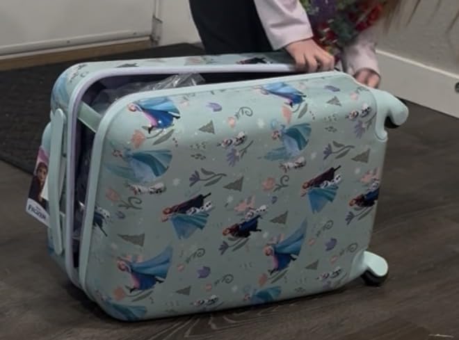 American Tourister Disney Frozen Carry-On Luggage - Airline Approved, Durable Hardshell with Favorite Frozen Characters - Spinner Wheels & Colorful Adjustable Handle customer photo 1