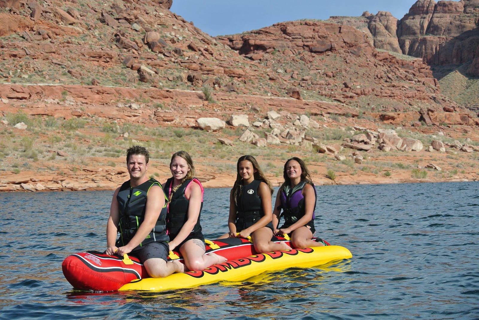 Airhead Hot Dog Towable Tube for Boating, 1-5 Rider Inflatable Boat Tube for Water Tubing, Full Nylon Cover, EVA Padding, Foam Padded Handles w/Neoprene Knuckle Guard, Speed Safety Valve customer photo 1